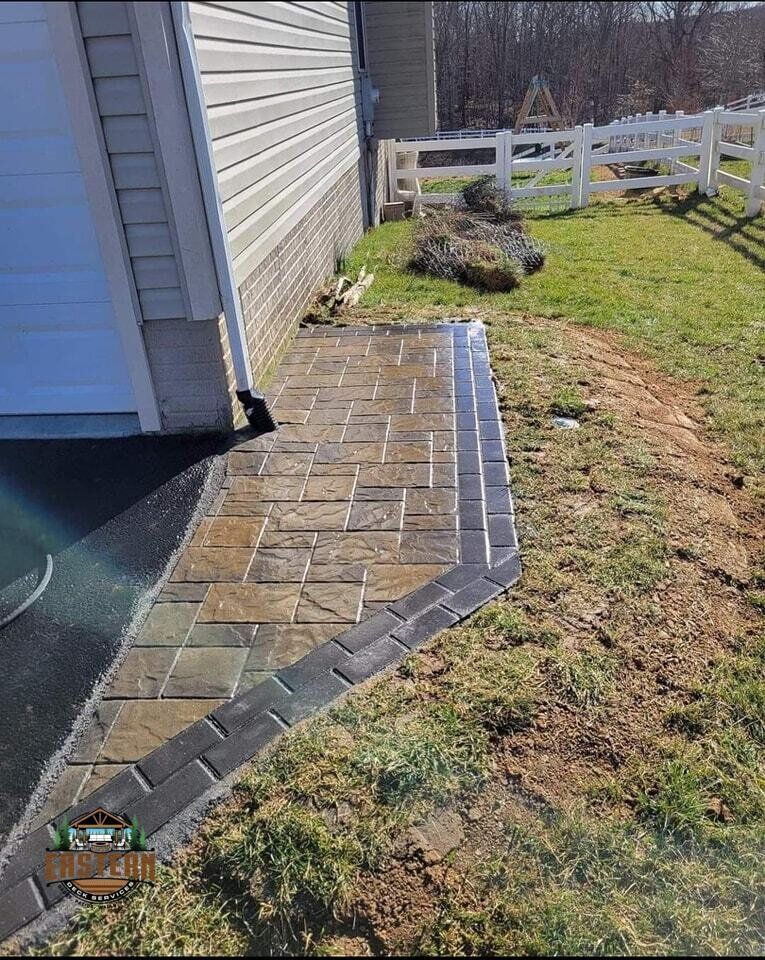 Third custom paver patio with wall project in Herndon, VA